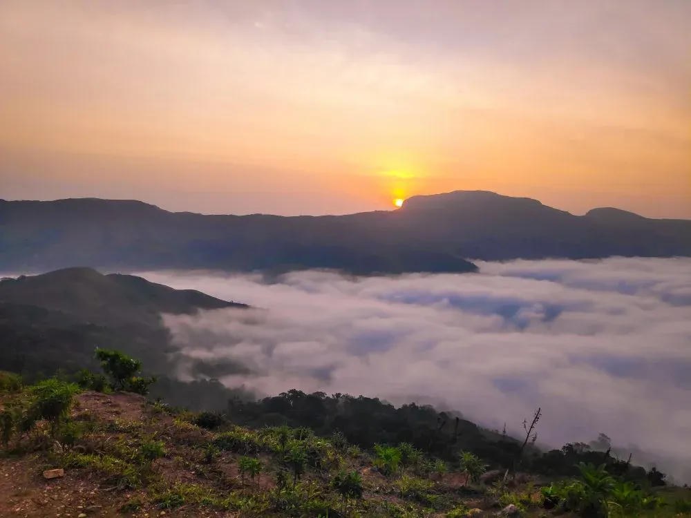 Sunrise above the clouds at Mandalpatti, Coorg